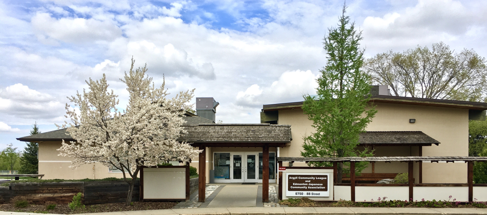Spring Blossoms on Tree next to Gate